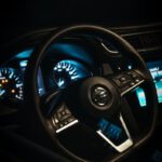 a steering wheel and dashboard of a car