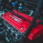 red and black car engine