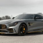 black mercedes benz coupe on gray asphalt road