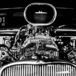 grayscale photography of vintage car engine