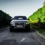 black bmw car on road during daytime