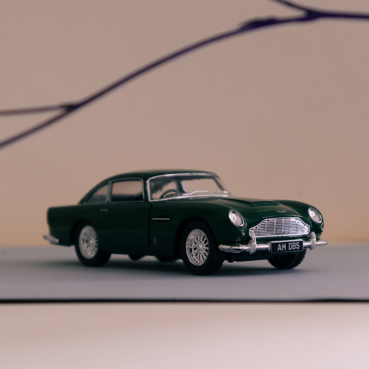 a toy car is sitting on a table