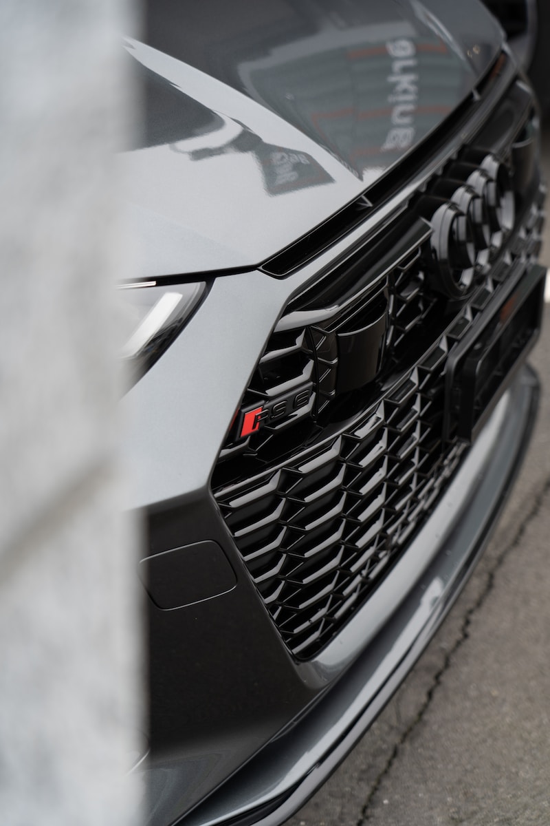 black bmw car in close up photography