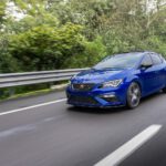 blue bmw m 3 on road during daytime