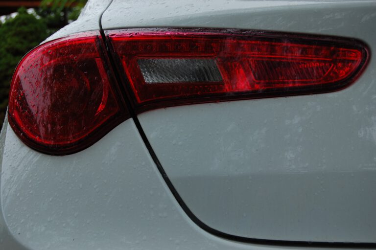 a close up of the tail light of a white car