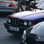 white bmw m 3 on road during daytime