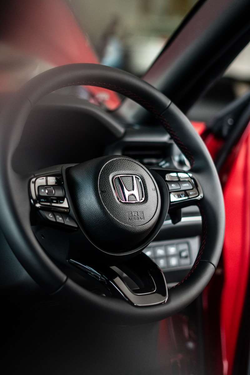 a steering wheel and dashboard of a car