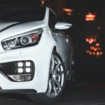 white bmw m series on road during night time