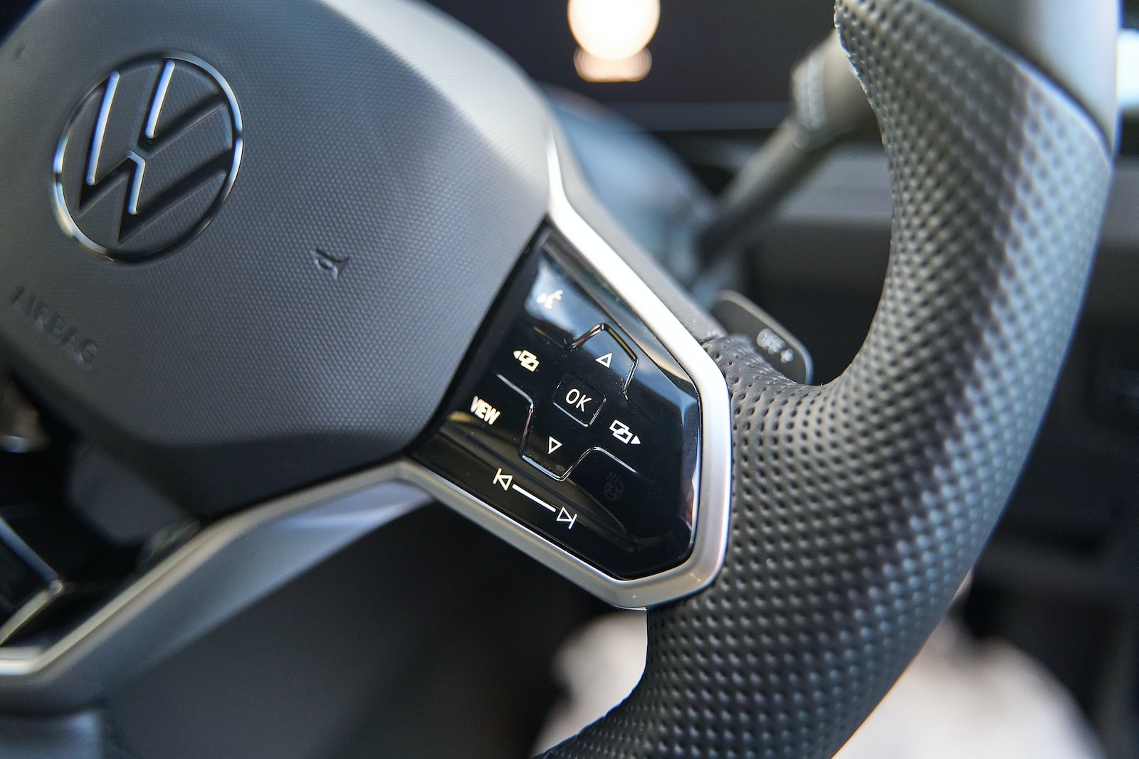 a close up of a car steering wheel