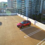 red coupe on road during daytime