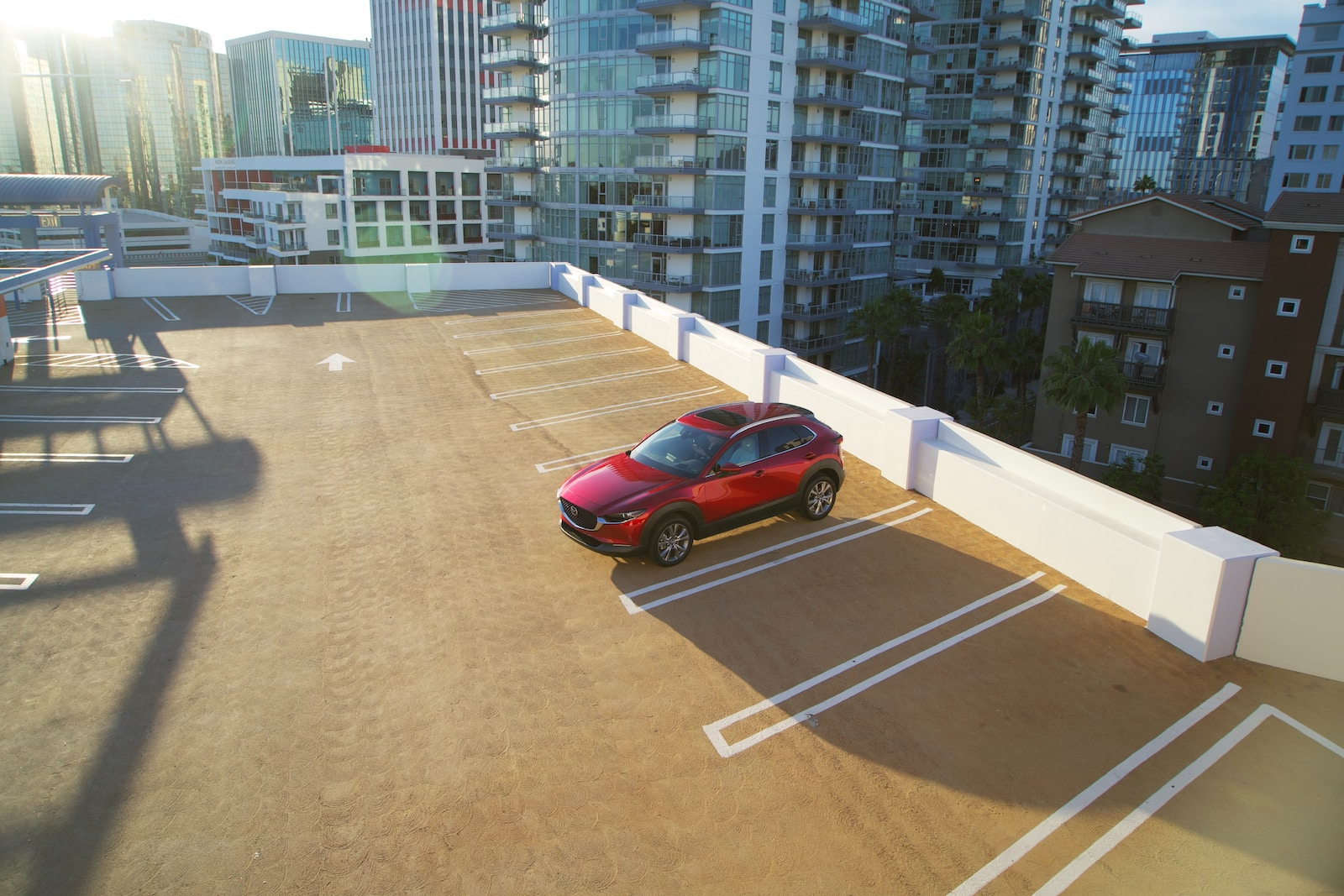 red coupe on road during daytime