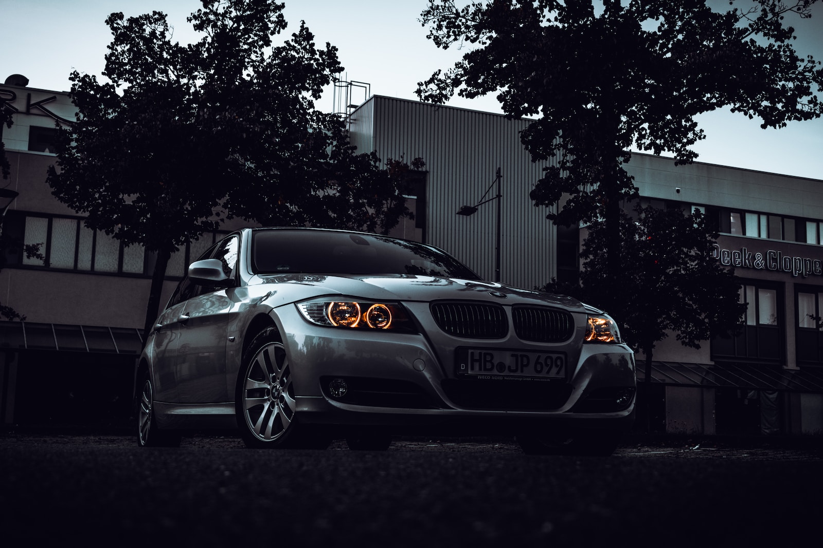 gray bmw m 3 coupe parked near tree