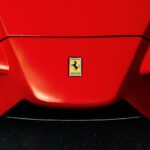 a close up of a red sports car