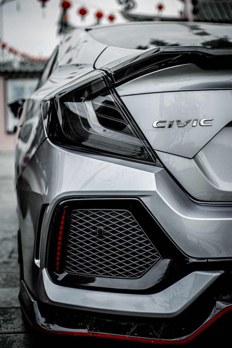 black mercedes benz car in close up photography