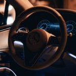 a steering wheel and dashboard of a car