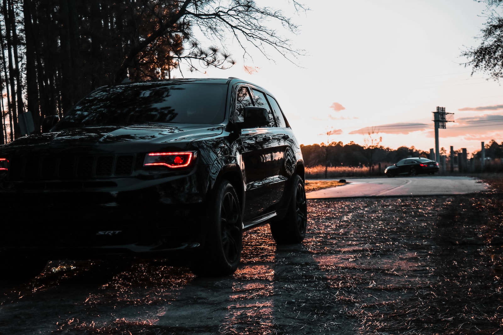 black suv on gray sand during daytime