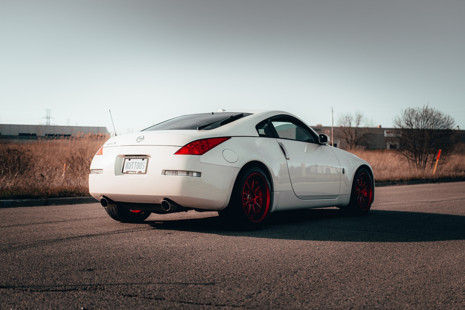 white porsche 911 on road during daytime