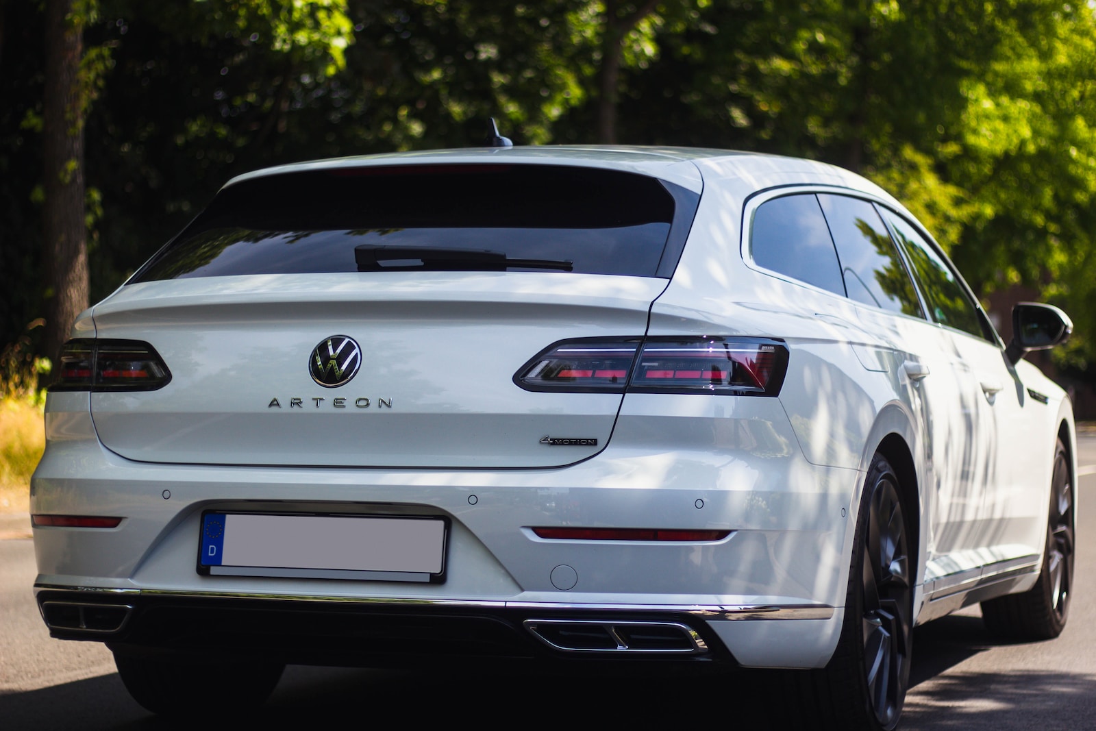 a white car parked on a road