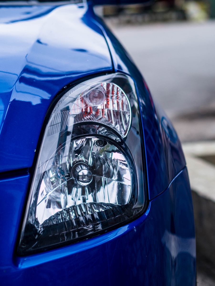 blue car with chrome wheel